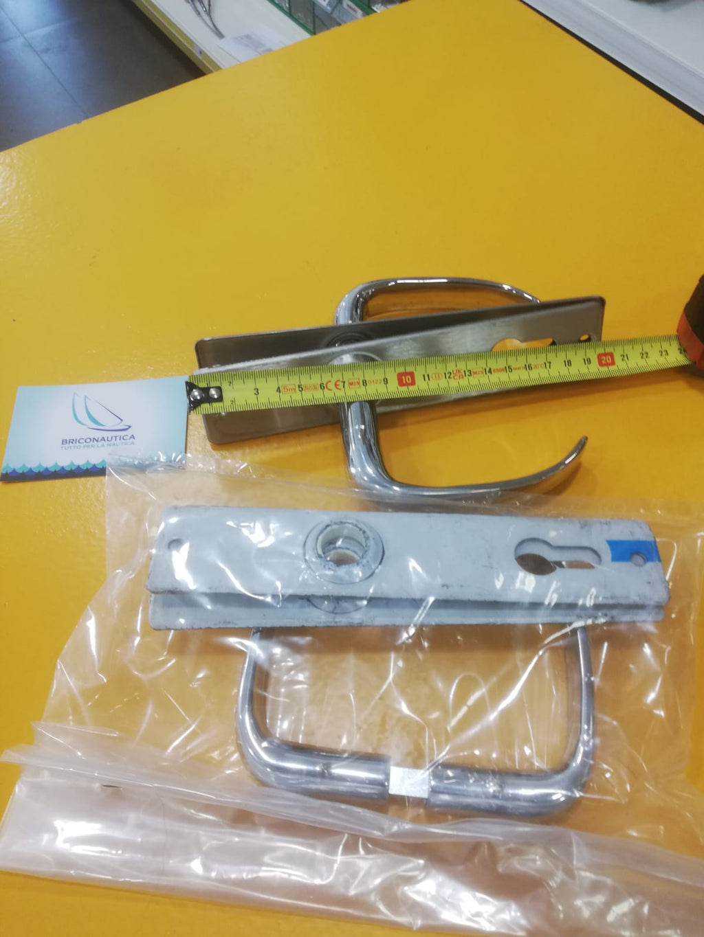 Maniglie per porta con mostrine Inox